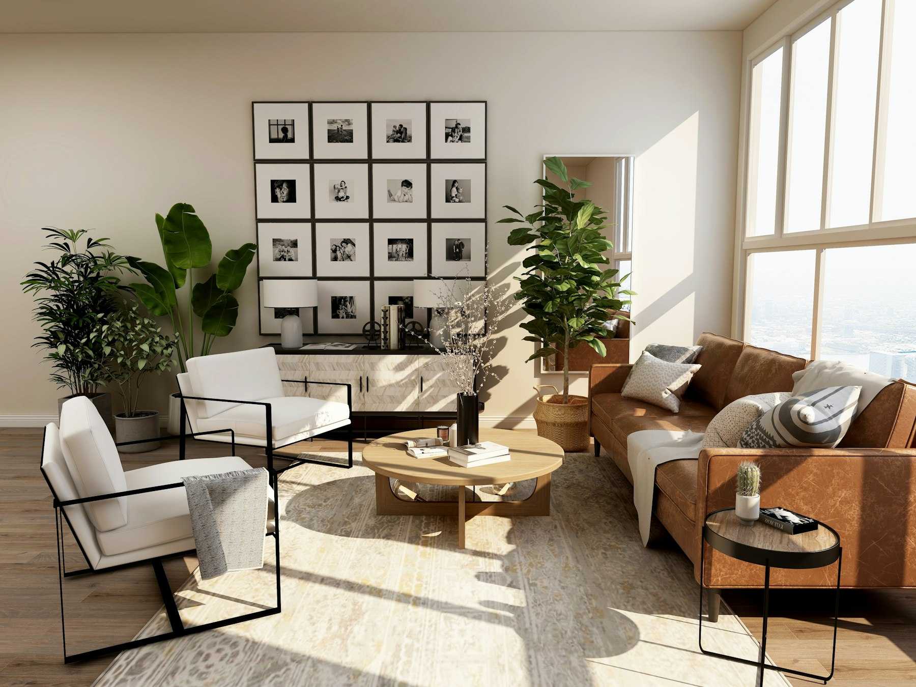 Sunlit living room with tan leather seating, black-framed chairs, and a gallery wall